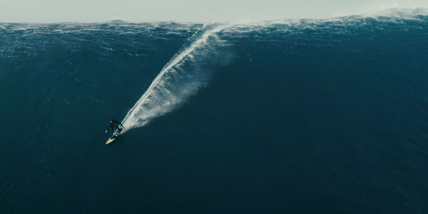 Riding the Peaks of Success: 100 Foot Wave