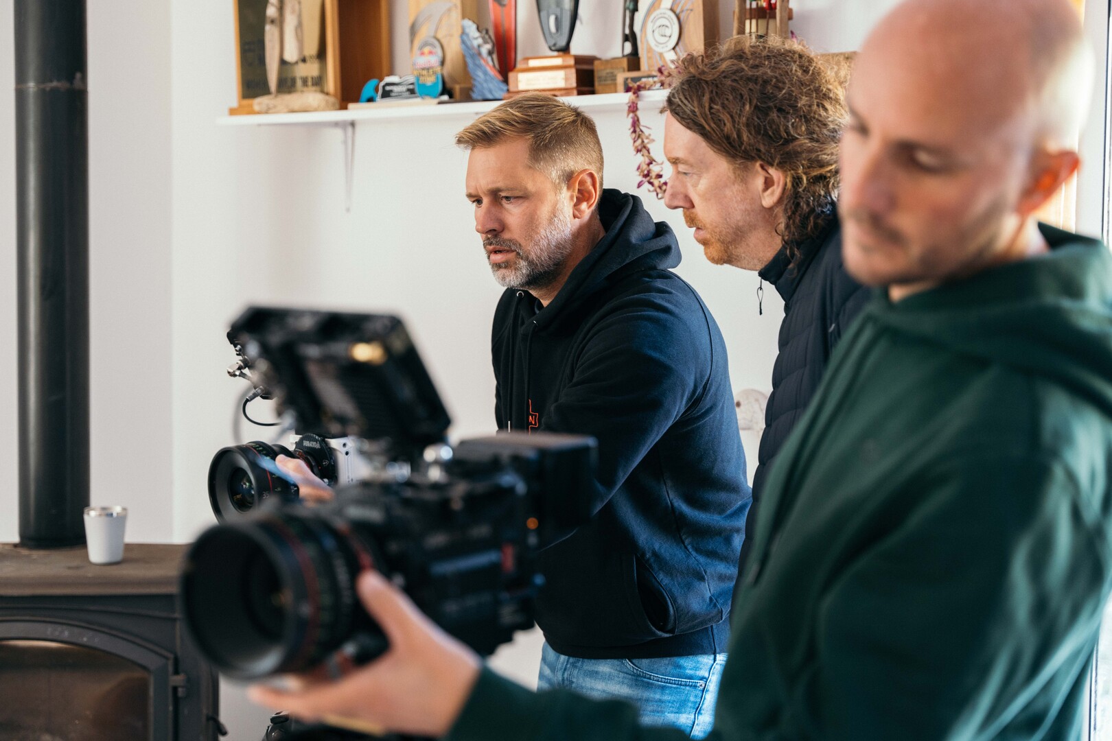 three men filming with RED cameras