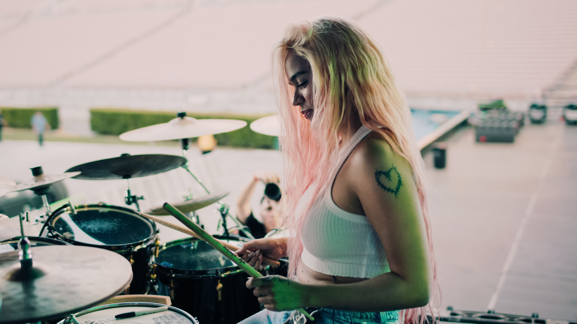 Karol G playing drums